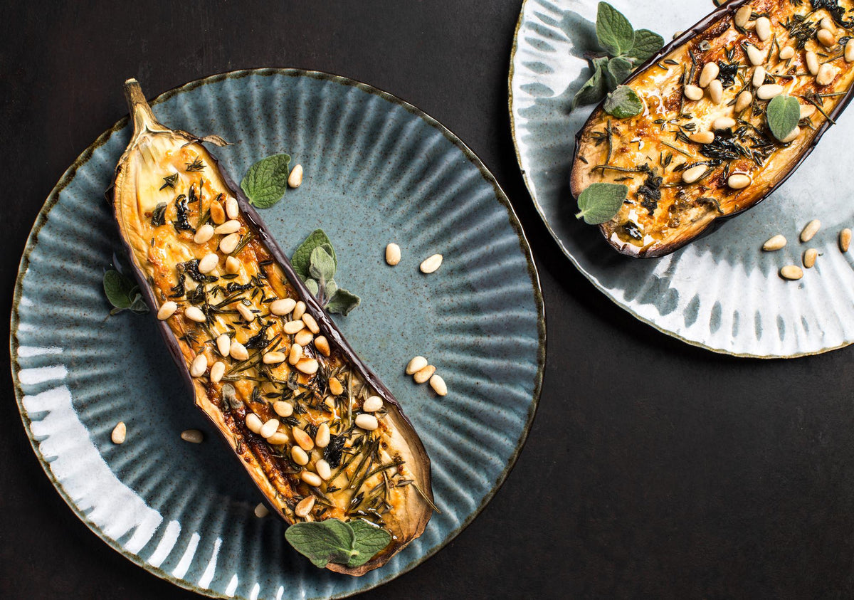 Geroosterde aubergine met pijnboompitten