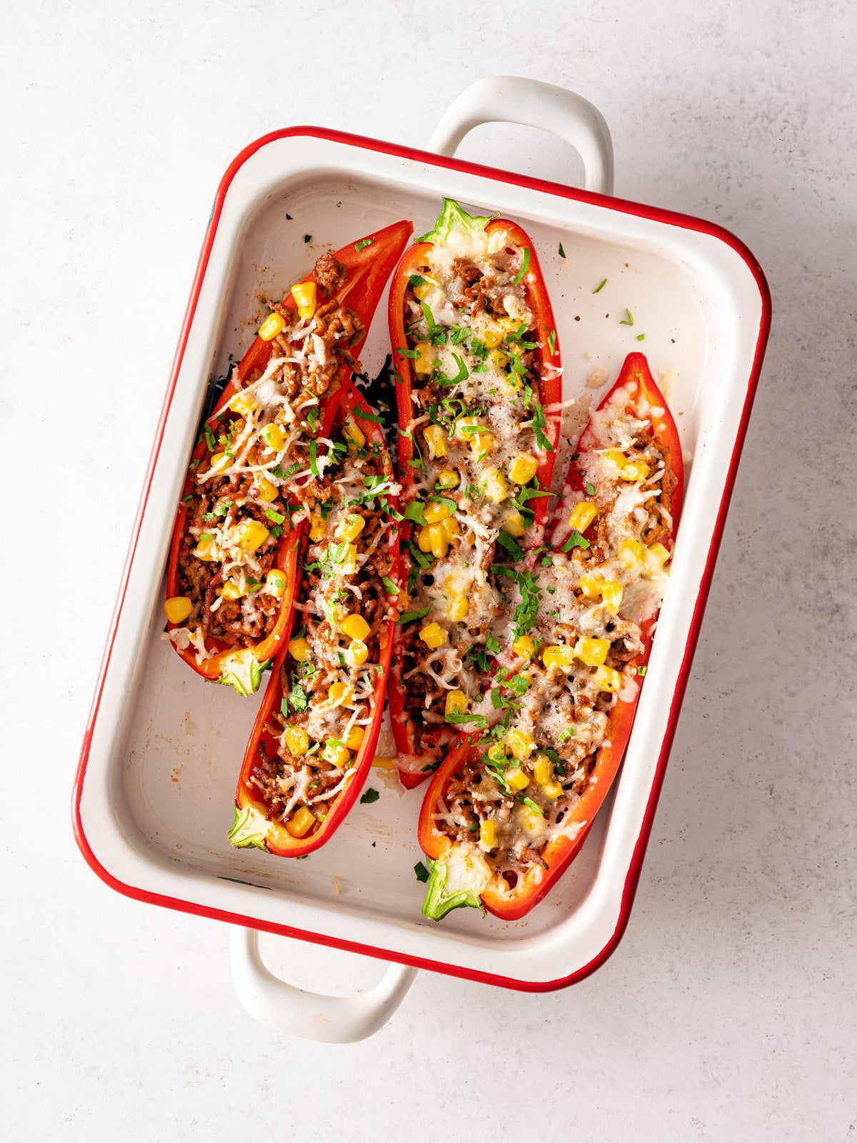 Gevulde paprika's gegratineerd met rundvlees